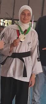 الفلسطينية جوري دكناش بطلة سوريا في رياضة التايكواندو